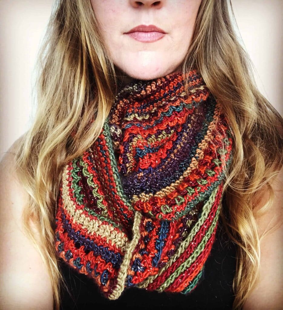 Sansa's Revenge easy crochet infinity scarf pattern worn by Tasha with blonde hair red crochet scarf