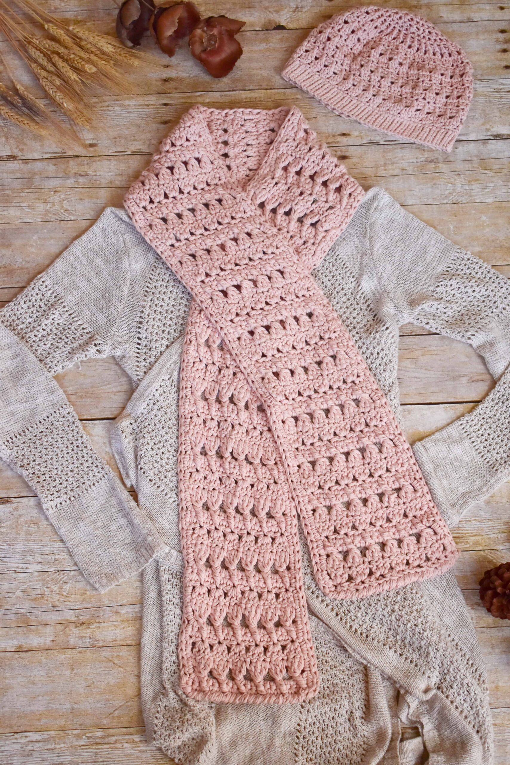 Winter Blush beanie and scarf on wood floor