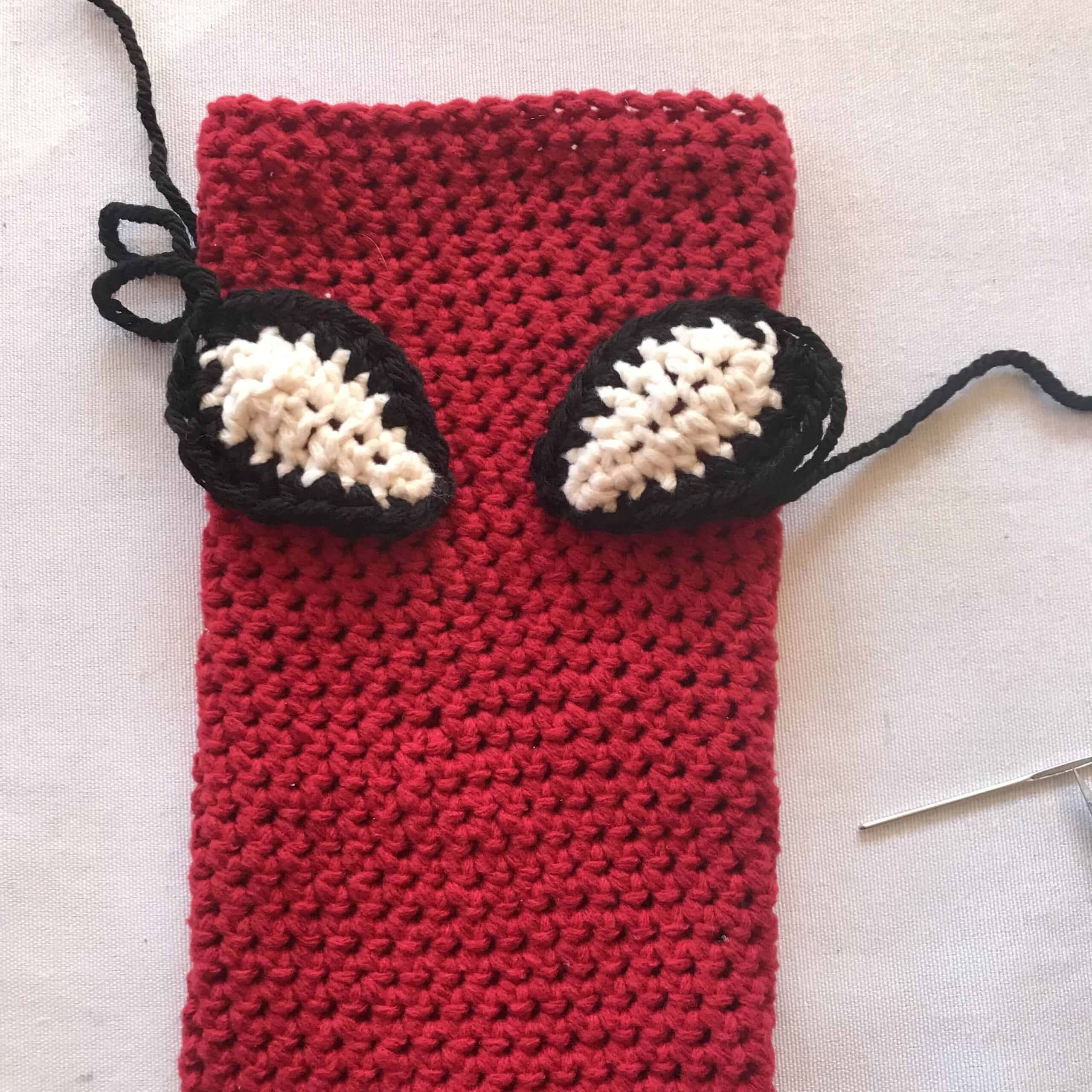 spiderman crochet cast covers close up with eyes