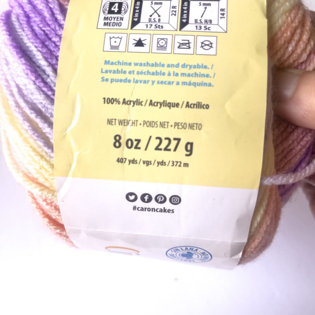 Up close of yarn label lto determine weight by yarn